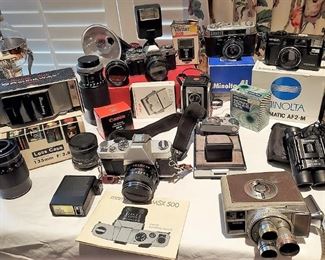 Camera and Camera Equipment: DeJua Electra, Vivitar 55mm Lens, Flash units, Canon AE-1, Minolta AL, Mamiya/Sekor MSX 500, SX 28mm 2.8 AND 135 2.8, Brockway Viewer, Bushnell 12x25,