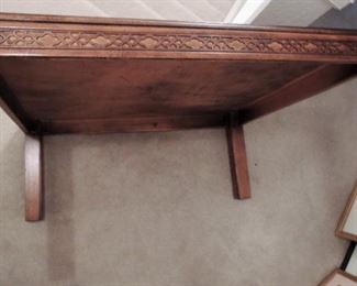 Carved wood coffee table