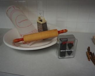 rolling pin, grater, Tupperware pastry mat, bowl