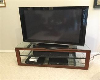 Panasonic 60" TV.  14 years old.  Works Great!  $475.00  Entertainment Table.  Glass, Wood and Steel (61"w x 17.5"h x 19"d):  $260.00