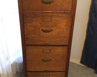 Antique Oak 4 Drawer Legal Paneled File Cabinet. (51.5"h x 21"w x 27"d):  $660.00