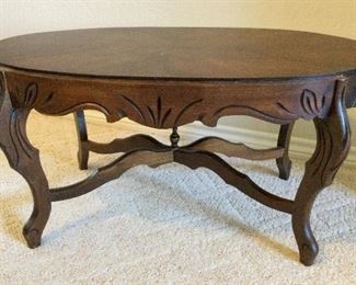 Vintage Oval Mahogany Coffee Table. Lovely Woodwork Detail (16"h x 33" w x 22"d):  $190.00
