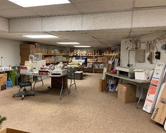 Boxes and boxes of new light bulbs, shopping bags, garment bags, jewelry boxes, hangers. Christmas decorations, fashion show risers, garment racks, etc.