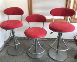 $125 Adjustable red velvet barstools in nice condition with minimal signs of usage they’re adjustable as pictured they go from 24 to 30 inches tall