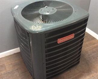 GOODMAN CONDENSING UNIT, SOME DAMAGE TO CASE