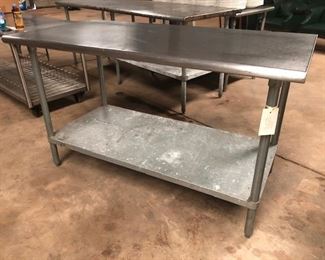 several stainless prep tables. Tops are good, bottoms not so much, would also make great workbenches