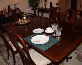 dining table and six chairs, plus two leaves