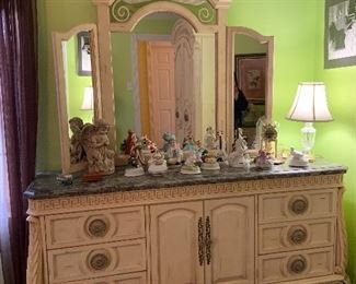 whitewashed dresser with green marble top and bi-folding mirror