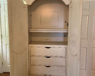 armoire for clothing or media