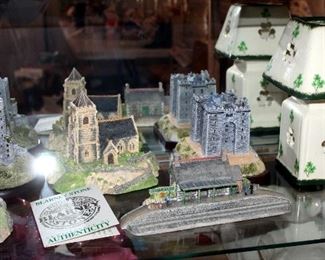 Irish Heritage Collectible Buildings Qty 7, St. Patrick Figure And Porcelain Shamrock Candle Votive, Contents Of Shelf