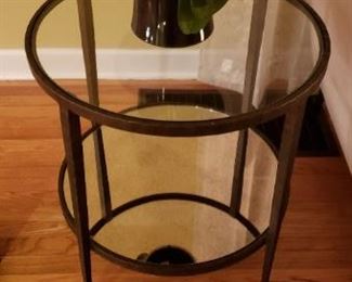 $125 Round glass and metal table