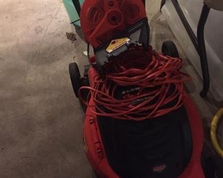 like new electric Black & Decker Lawn mower--comes with cords