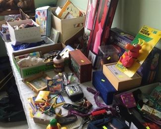 lots of stuffed animals, toys and girls' crafting books