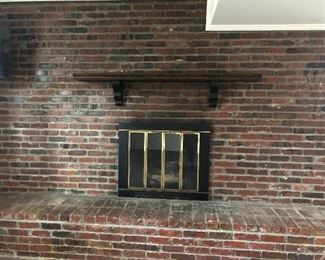 mantel, fire place, you can even take out the brick