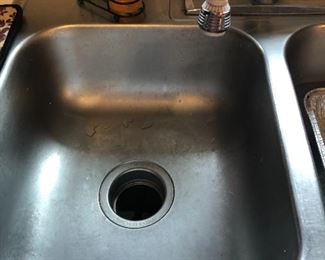 kitchen sink with garbage disposal