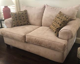Suede-like upholstered loveseat