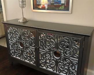Home Meridian silvered cabinet with carved and mirrored doors