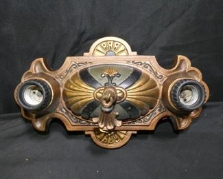 Flush mount cast iron Art Deco Ceiling light
Description 	
2 sockets
Has been rewired
Bronze with gold, black and green accents
12.5" x 7.5"
UPS STORE PACKING & SHIPPING
