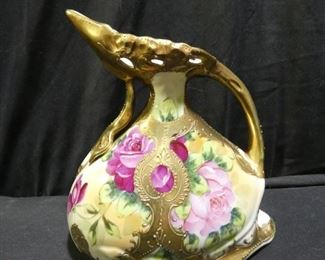 Gorgeous Nippon Like Painted Flower & Gold Pitcher
Description 	
Gorgeous & in Great condition.
- Nippon Like Painted Flower & Gold Ewer Pitcher 6.5" x 7.5" tall
UPS STORE PACKING & SHIPPING