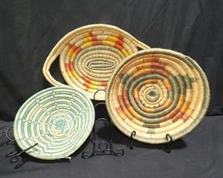 3 Colorful Coiled Baskets
Description 	
- 19" x 13" - Yellow Gold Orange Green Handled
- 13.5" Diameter x 2.5" Tall Yellow Orange Green
- 11.5" Diameter x 3.5" Tall Bowl Aqua and Beige
