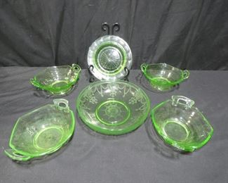 6 Piece Green Uranium Depression Glass
Description 	
- 4 Handled Uranium Glass Bowls (1 with Chip) - 7" Handle to Handle
- Green Uranium Glass Trinket Tray 7" Diameter
- Green Depression Glass Serving Bowl 8.5" diam
UPS STORE PACKING & SHIPPING AVAILABLE