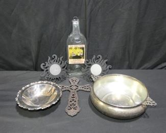 Home Decor
Description 	
- Large Metal Cross 11.5" tall
- 2 Sun VotiveWall  Sconses
- Glass Wine Bottle artpiece
- Footed Silver Plate Bowl William Rogers by Onieda 7.5" diam
- Cheffield Silver Plate Bowl with Handles 12.5" handle to handle
UPS STORE PACKING & SHIPPING