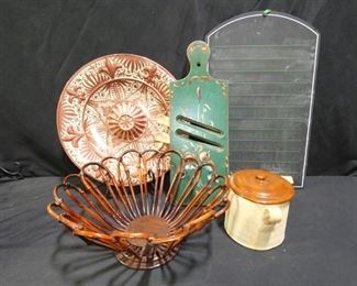 Kitchen Decor
Description 	
- Large Decorative Plate - Made in Spain - 14" dia.  - a few chips around the edges - Wallhanger - signed VG - Metalic Copper
-Tole Painted Bread Board and Knives - Wall Hanger - 17" tall x 7.5" wide
- Bent Wood Open Basket - 13" dia. x 7" tall
- Kitchen Chalkboard - 19.5" x 12" tall
- Handthrown Pot with Lid - glazed inside with glazed lid - Brown Pottery - small chip - Valor Ware imprinted on side - 5.75" x 5.5" tall
UPS STORE PACKING AND SHIPPING