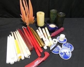 Assorted Candles
Description 	
-3 pillar - 2 green and one cream colored
- Flame Shaped Candle
-Metal Candle Tray for Pillar Candle
- 4  - Blue and White Langelinie Plates - one plate chipped - 3.25"
- 21 - Taper Candles - 2 are broken
- Body Shop Candle - in Blue Glass Votive
UPS STORE PACKING & SHIPPING