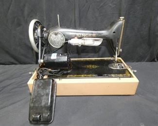 Singer Sewing Machine -Model AB020295 - 1926
Description 	
-In Case - 2 Tone Brown Case
-Electric
- Model AB020295 - 1926
UPS STORE PACKING AND SHIPPING