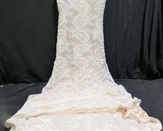 Jim Hjelm Couture Collection Wedding Dress
Description 	
- Jim Hjelm Couture Collection
- Size 12 
- Lace and Sequin Over Blush Colored Dress
- See pictures for condition 
SHIPPING AVAILABLE