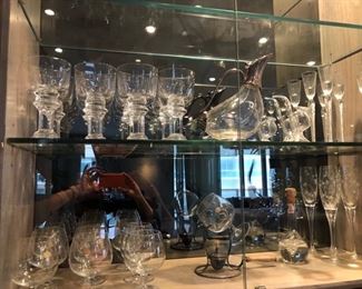 Glassware - the Napoleon Glasses are probably baccarat, the tall swirl Rosenthal?, the Champaign dots 2000 are Royal Doulton.  The top left not marked or identified.