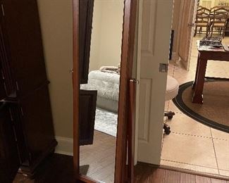 Floor mirror with hidden jewelry cabinet 