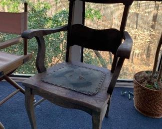 Antique farmhouse chair with leather seat