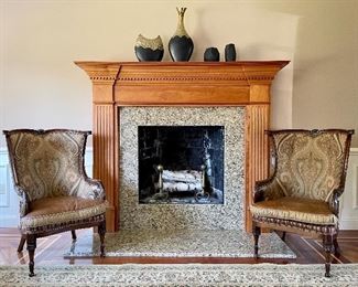 Item 104:  (2) Jeff Zimmerman Collection Gretchen Wing Back Arm Chairs with Reversible Cushions - Combines classic paisley and tonal stripes with the ruggedness of leather - 26"l x 23"w x 42.5"h:  $2200 for pair