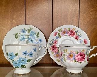 Item 142:  (2) Teacups, one with blue flowers:  $24