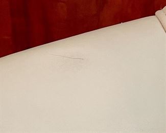 teeny tiny mark on leather