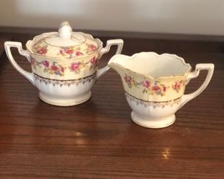 Gold Castle China creamer and sugar bowl/w lid.
