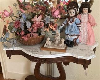 Lyre base marble top antique table; mirror; antique dolls