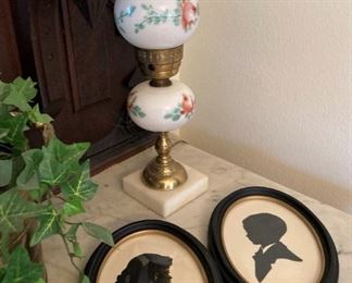 Vintage framed silhouettes; vintage lamp 