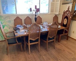 Another view of the dining table, there are 8 cane backed chairs, 7 of them are in great condition, the 8th needs repairs and is not shown. "King" chair shown is sold separately.