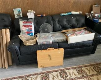 vintage leather sofa sleeper, plus art and sewing supplies and vintage patterns