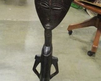  AFRICAN ELONGATED WOOD FIGURE WITH STAMPED METAL CROWN. 30" TALL