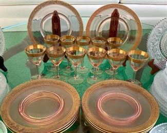 Antique/Vintage  Glassware. Includes 13 clear plates- possibly sandwich pattern, 12 bowls, 10 pink plates with gold trim and 10 small cordials. (one broken after the picture was taken/there are 11 in the photo. However; only 10 are included) 