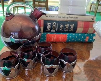 Vintage Kitchen Items - includes cookbooks, milk glass compote, pottery pitcher and a vintage pitcher/glass set from Farber brothers in a deep shade of purple. 