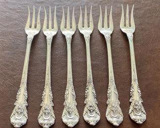 Six Wallace Sterling Relish Forks (Sir Christopher). Each fork measures about 5.8” 