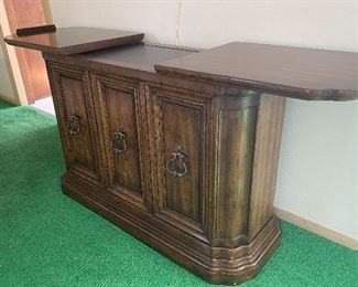 Vintage Expandable Sideboard/Console by Heritage. Measures 47" L x 19" W x 31" H. Located on the second floor of the home