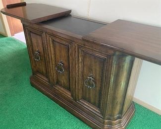 Vintage Expandable Sideboard/Console by Heritage. Measures 47" L x 19" W x 31" H. Located on the second floor of the home