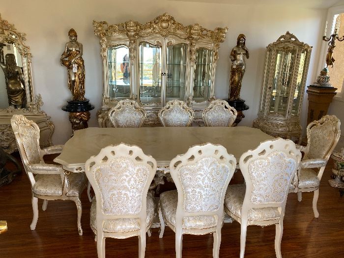 Marble top Italian / French provincial style dining table and 8 chairs $4,500
Italian rococo marble top with 8 chairs. 
New condition.
Measurements: 87 x 45” 