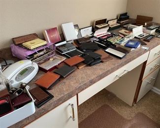 Lots of wallets, pen sets, etc.