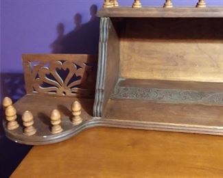 Ornate wall shelf that is very unique
